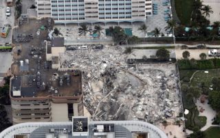 Aerial view of emergency workers and crews search Surfside Condo collapse rubble for survivors