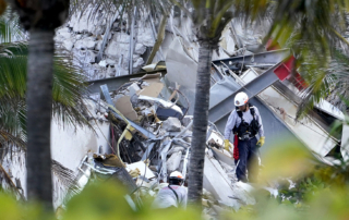 Crews search for survivors in the rubble of the Surfside condo collapse
