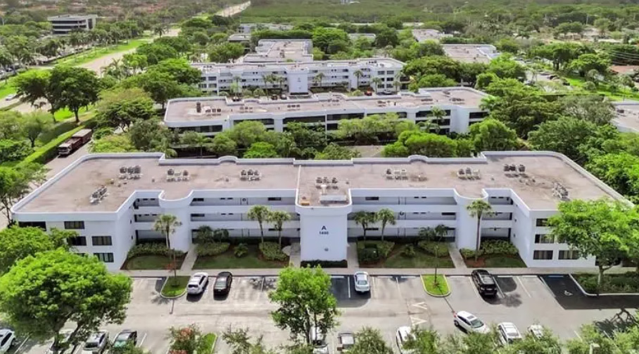 Front view, aerial drone photo of Sheridan by the Beach residential condos in Hollywood, FL