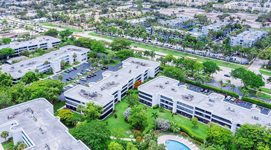 Three quater view, aerial drone photo of Sheridan by the Beach residential condos in Hollywood, FL