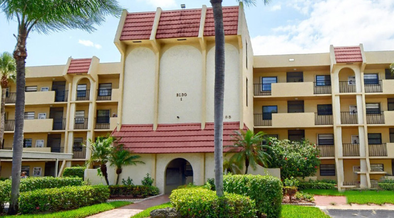Front view, aerial drone photo of Sheridan by the Beach residential condos in Hollywood, FL