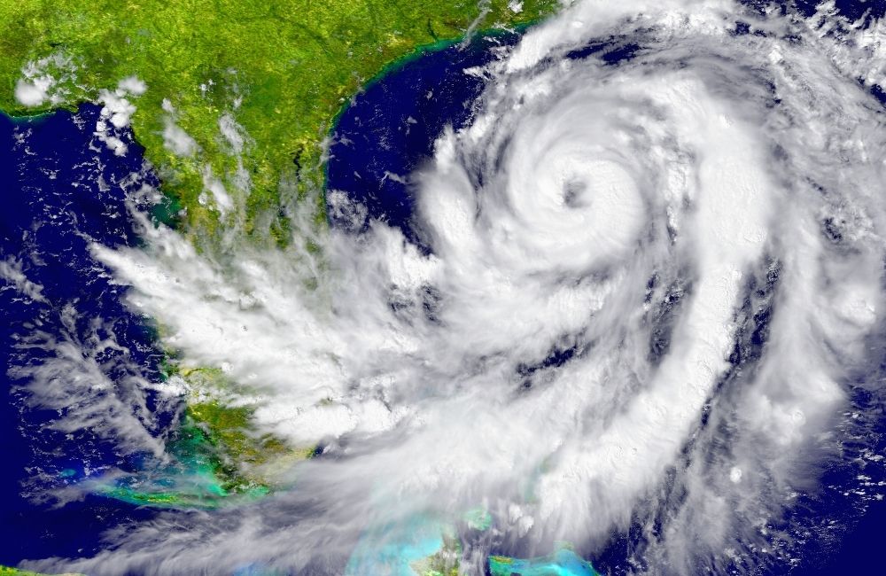 Satellite view of a hurricane approaching Florida for condo storm preparedness planning.